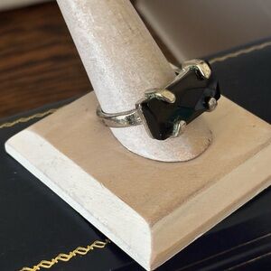 Black faceted stone and Silver ring. Coffin